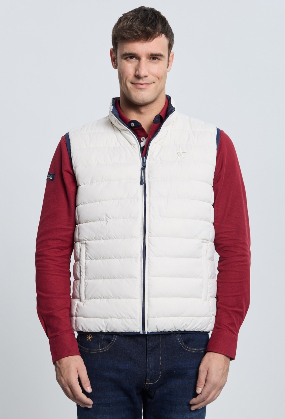 Chaleco acolchado reversible azul marino con blanco roto