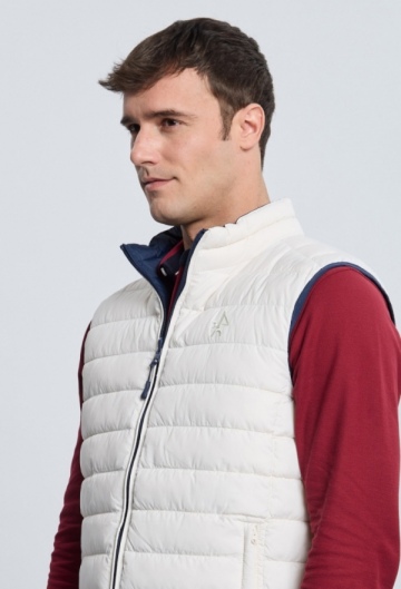 Chaleco acolchado reversible azul marino con blanco roto