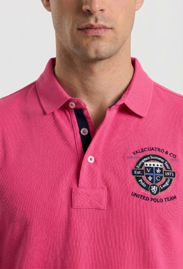 Polo semibordado United rosa